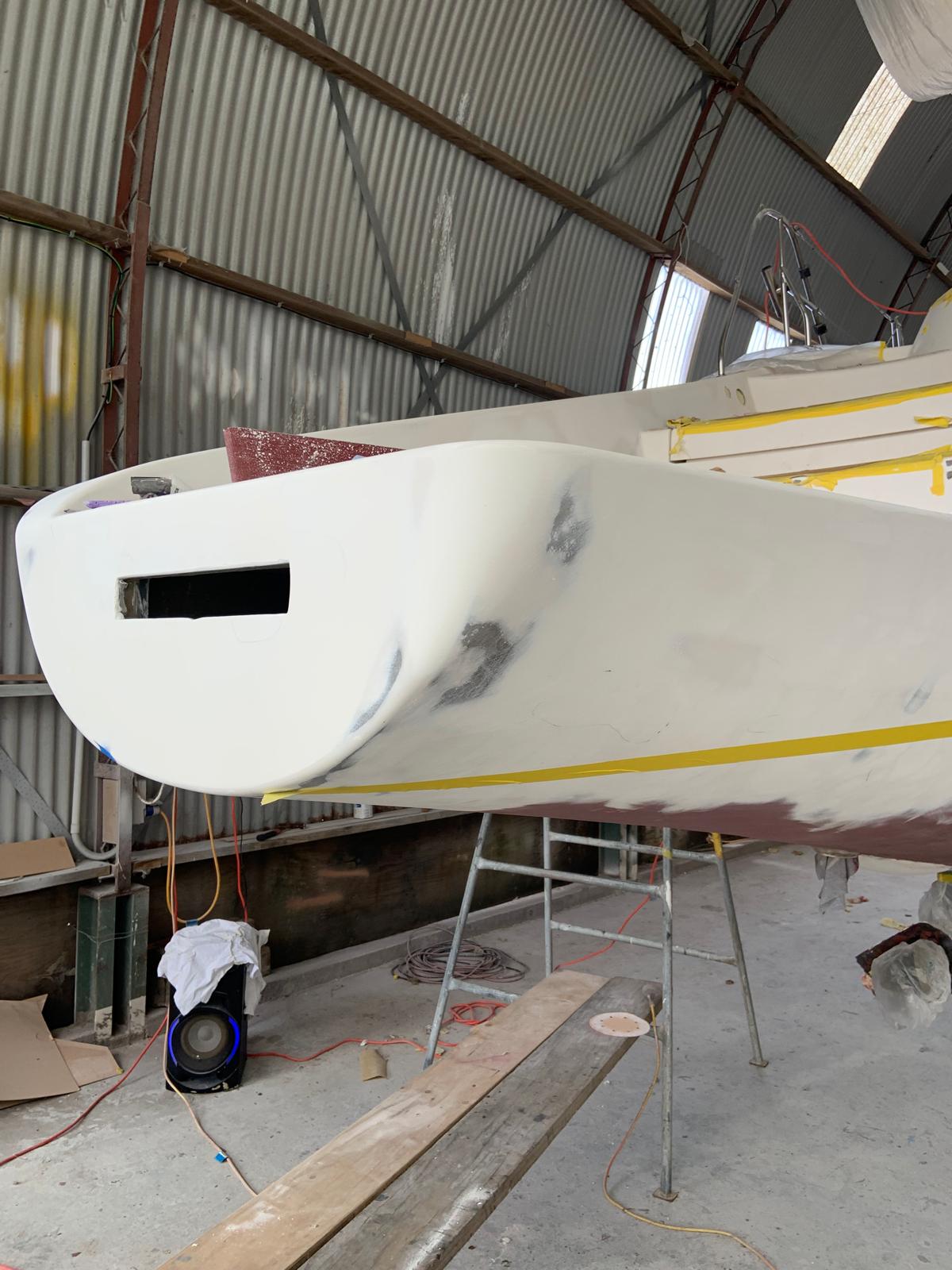 Hull being faired ahead of paint